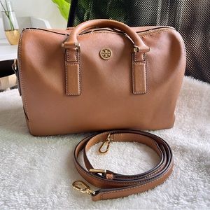 Tory Burch barrel top handle tote bag with strap.